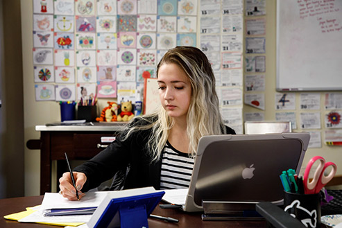 Student studying at a computer 