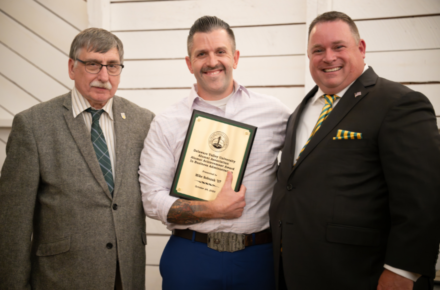 An Alumnus received an alumni award in business. 