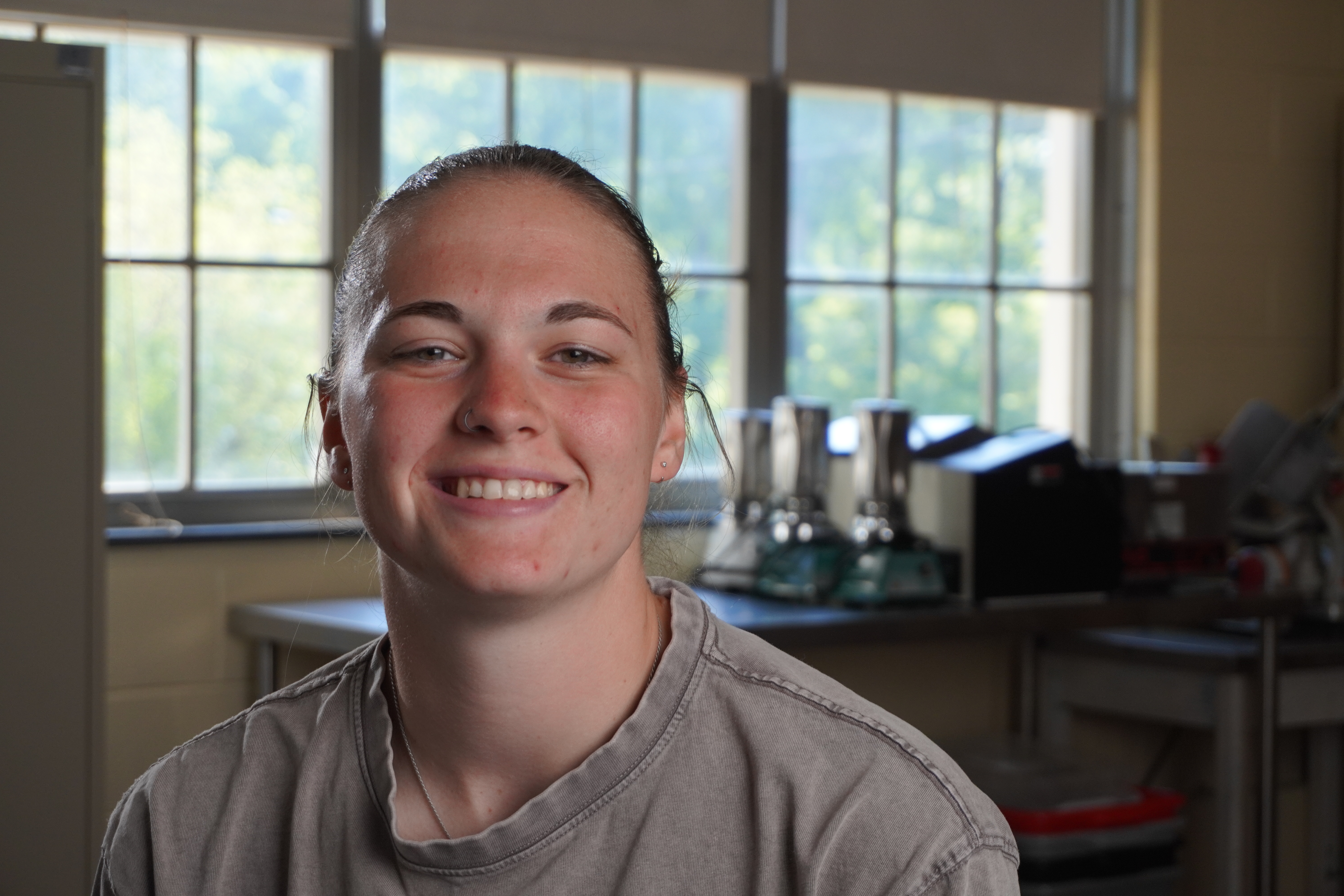 A headshot of Tori Brockrath '26 in the food science lab.