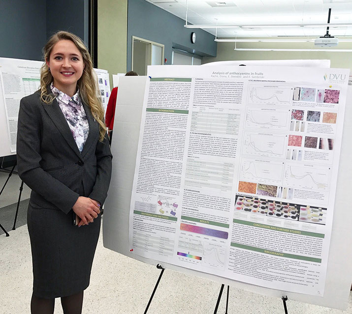 Diana Rachii with her poster on fruit pigments. 