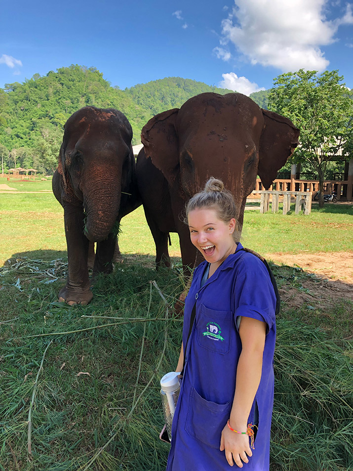A Delaware Valley University student, Madison Dembinski, in Thailand at an elephant sanctuary.