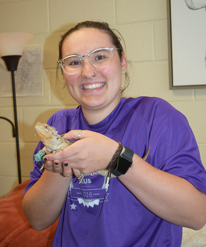 Cassidy Vinal with her bearded dragon, Louis.