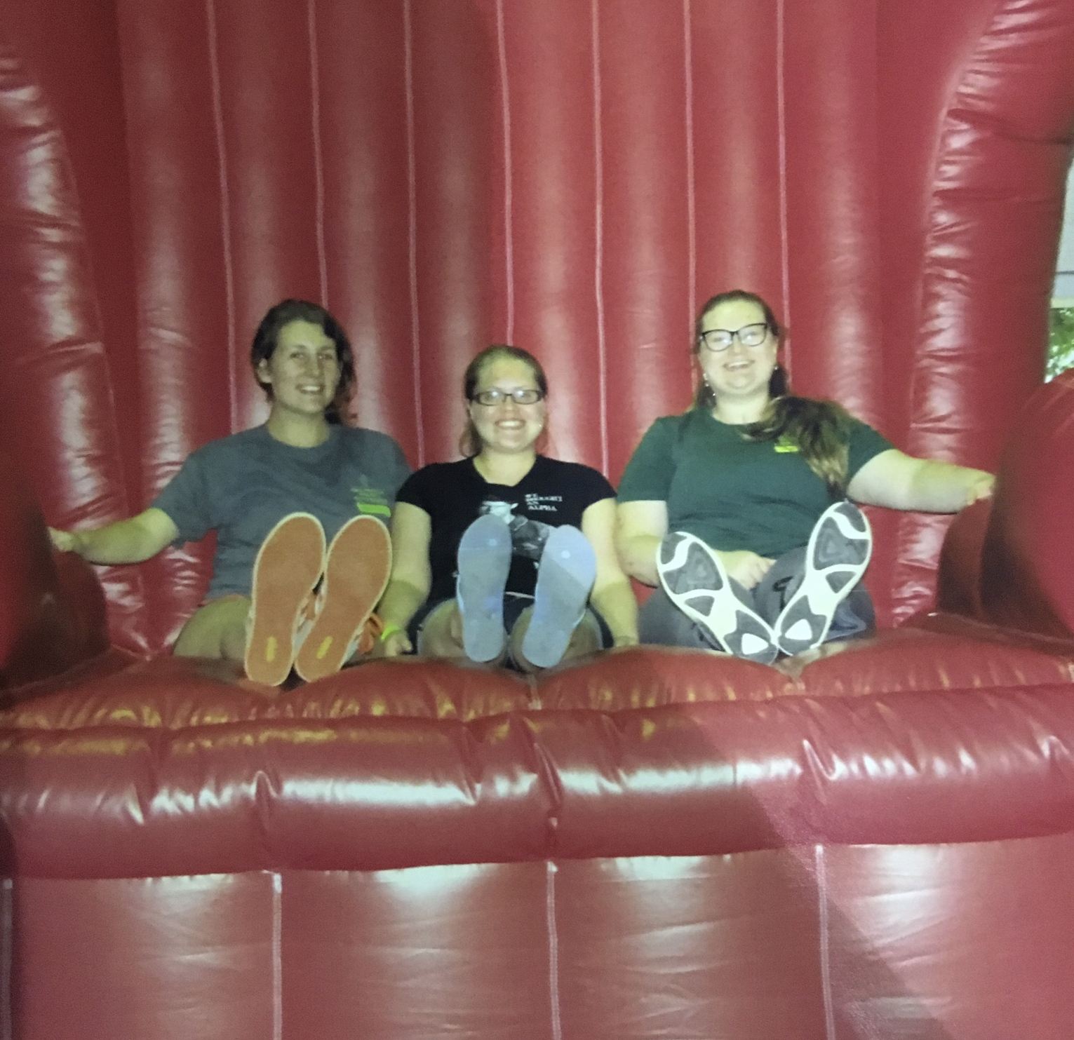 Jillian and friends on a large red chair