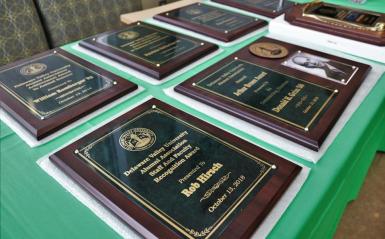 Award plaques on table