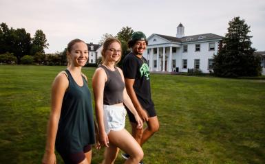 Students from the College Tour are walking on the quad.