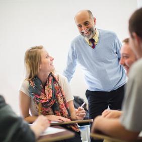 Dr. Tony La Salle, a professor in Delaware Valley University’s Department of Education, teaches a small group of students who are taking notes.