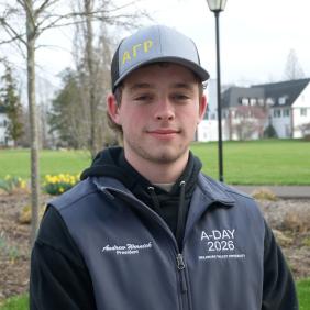 Headshot of Andrew Wernick outdoors outside of the life sciences building.