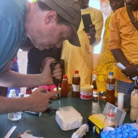A photo of professor Ian Tietjen working in his field. 