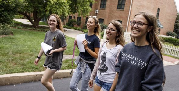 Students walking to class on campus 