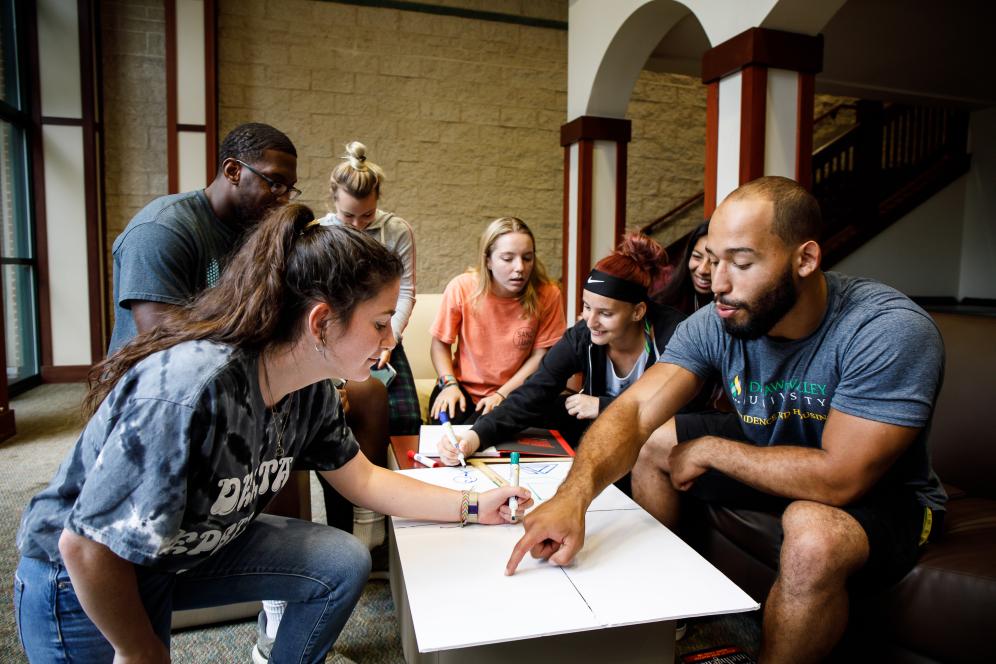 a group of students working in South hall