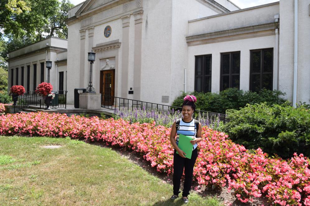 Student smiling on first day of classes. 