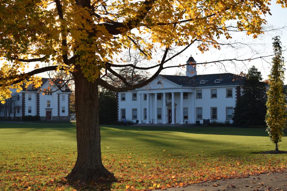 Beautiful campus building and fall trees