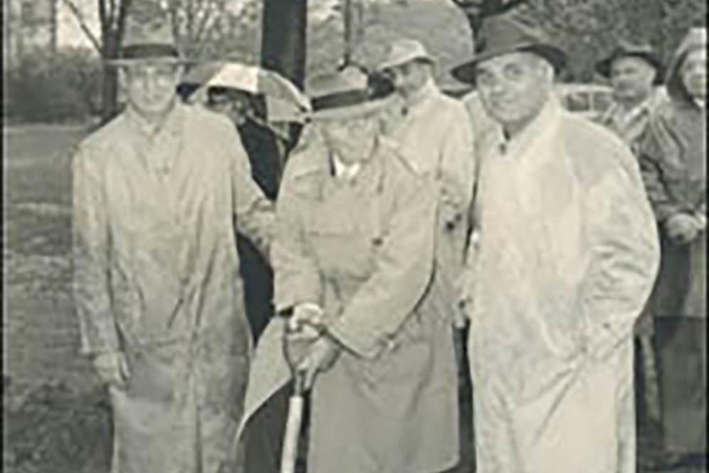 Several people at a 1950s ground breaking ceremony