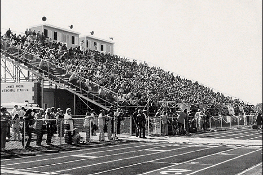 Stadium of people at a sporting event in the 1950s.