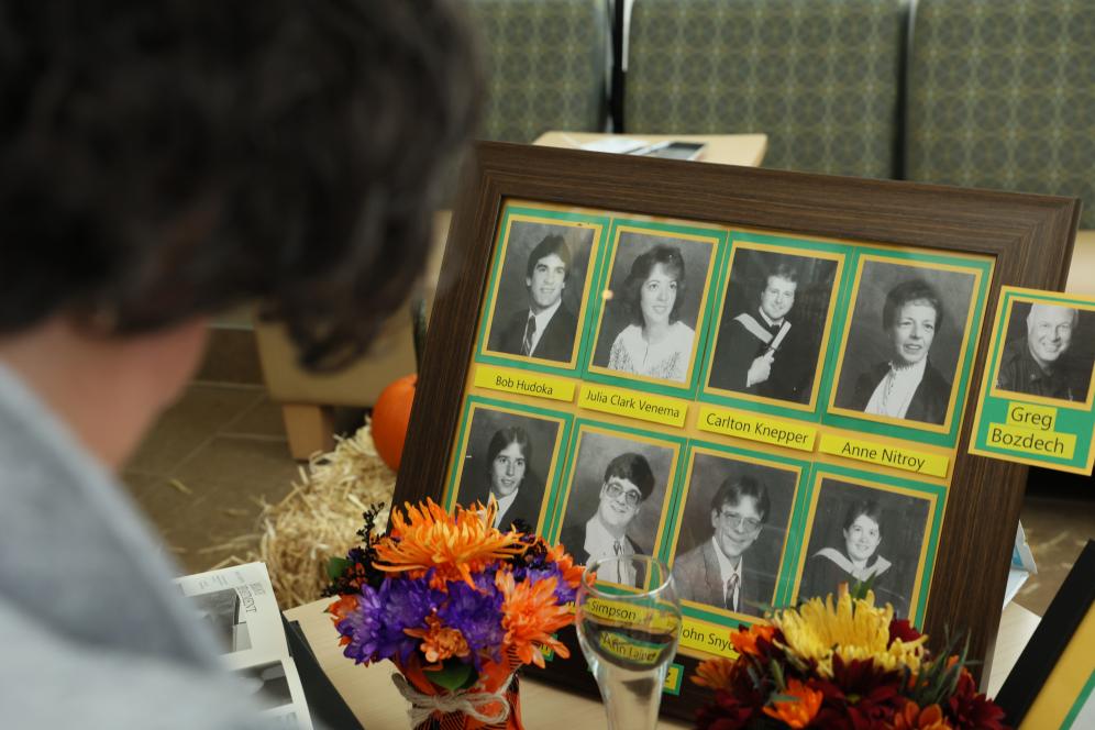 A photo album of old pictures of students from 1985.