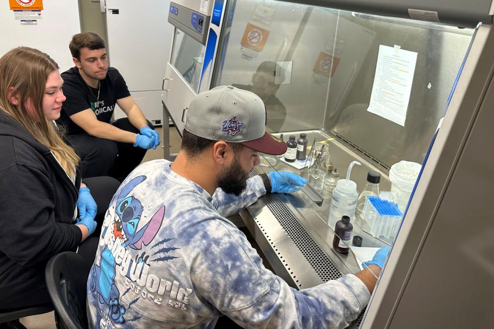 Katie Stewart Vincent Petulla and Jacob Sanchez - training in basic microbiology methods - Gram Staining