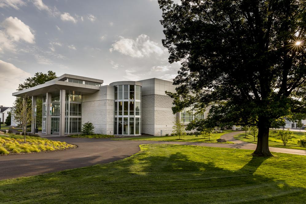 A wide photo of the outside of the life sciences building on a sunny day. 