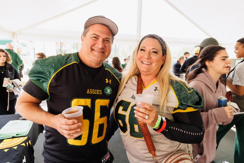 Homecoming 2024 alumni dressed in delval gear 