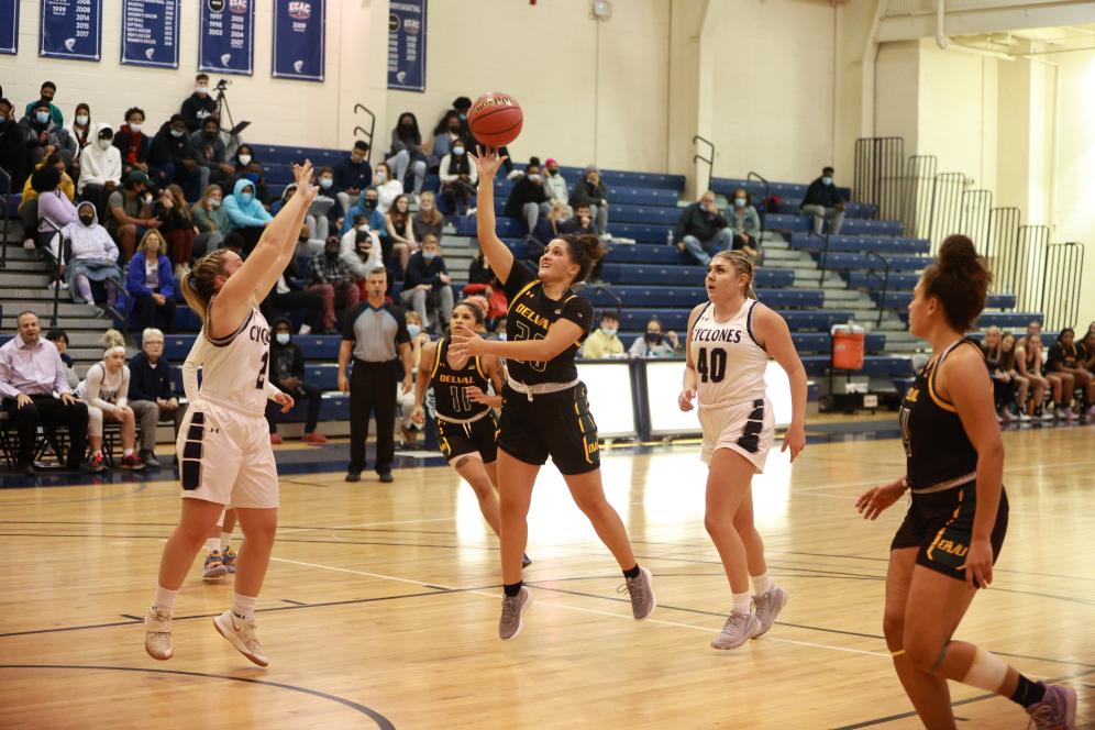 A women's basketball game in session. 