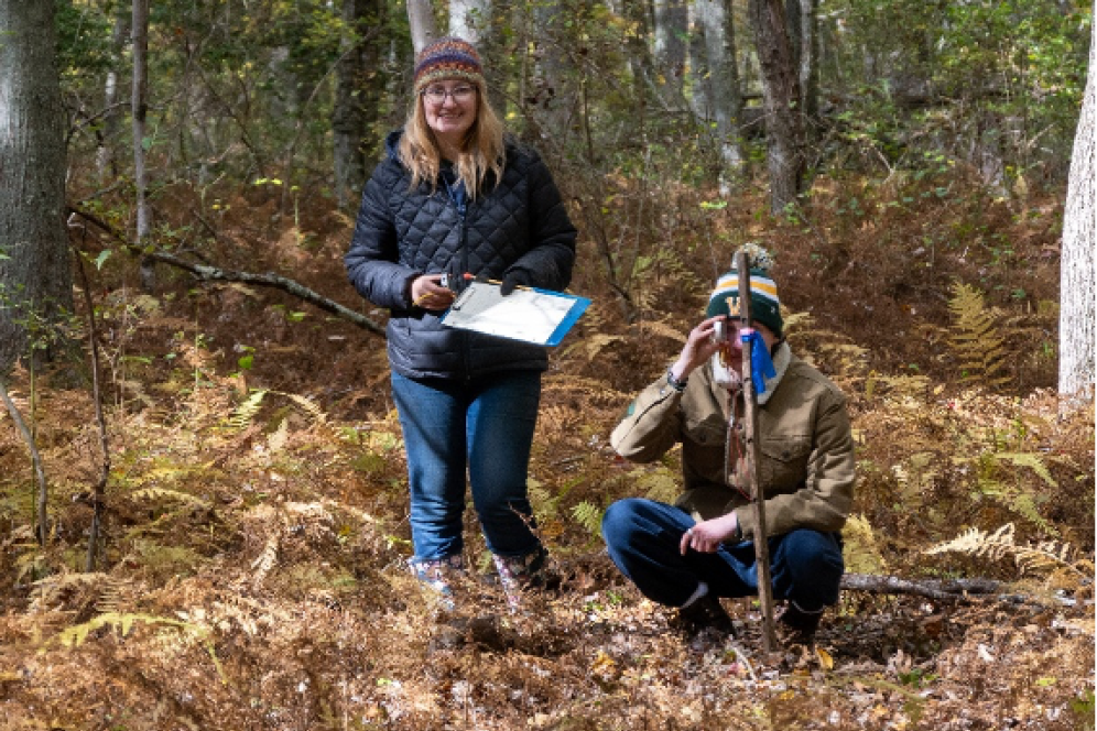Soil Judging Team Student and Dr. Adrienne Kleintop in a soil pit. 