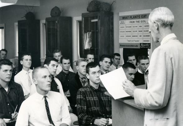 Professor of Biology Paul Bowen instructs a class in 1959