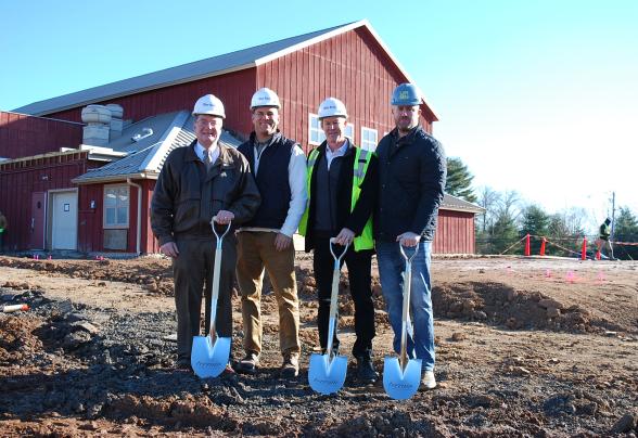 Dr. Ben is with Blue Rock members at the construction of Terrain on campus.