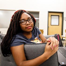 a student in the commuter lounge