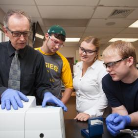 Chemistry professor with students