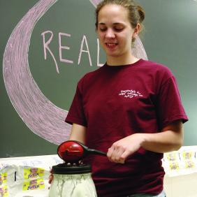 A student making butter