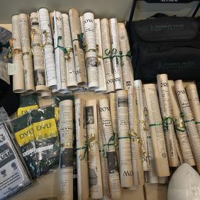 DelVal souvenirs on a table for alumni to win as prizes.