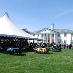 Tents are set up on the quad for Green and Gold Day 