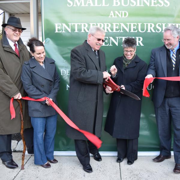 DVU staff members and New Britian Township officials cut the ribbon to open the center.