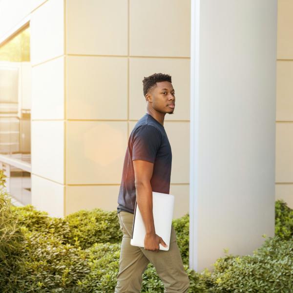 student walking on a campus