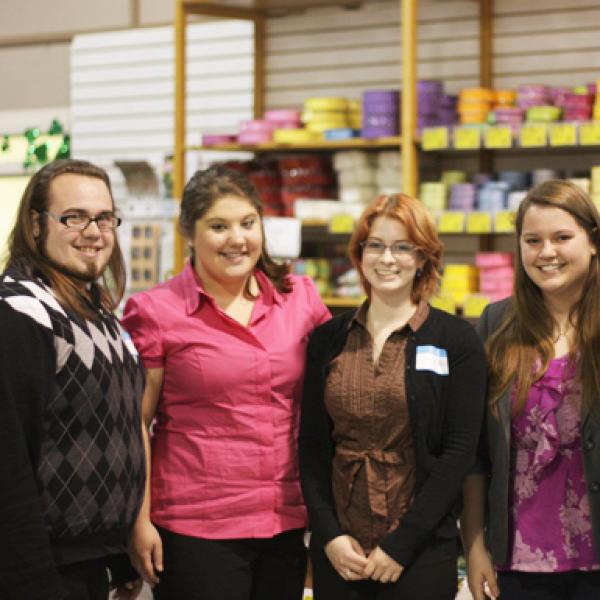 Floral Society Group of students with ribbon supplies behind them
