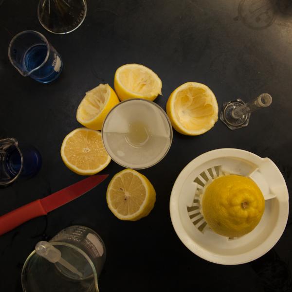 Lemons being juiced.
