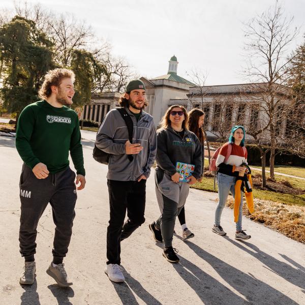 A group of students walking to class. 