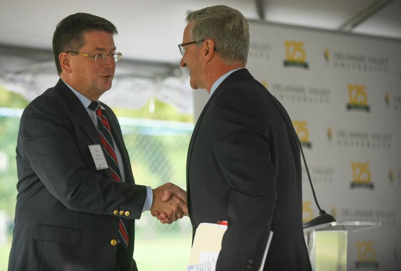 DelVal President Dr. Benjamin E. Rusiloski shakes hands with Pennsylvania Secretary of Agriculture Russell Redding 