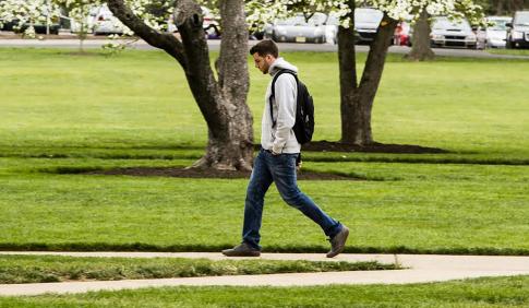 A student walks through campus