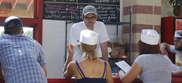Students learning to make ice cream in the DVU farm market
