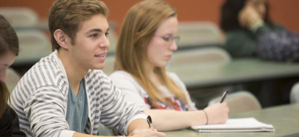 Student attentively learning in a classroom 