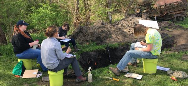 Students learning in the field.