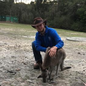 Christian Anderson, a Delaware Valley University student with a kangaroo. 